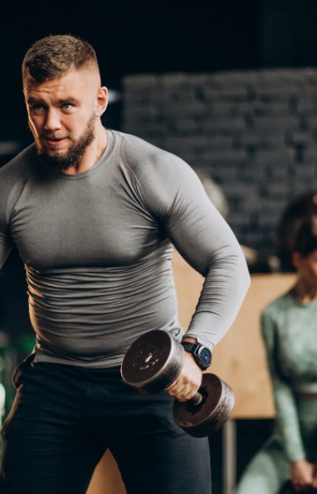 Couple training together at the gym